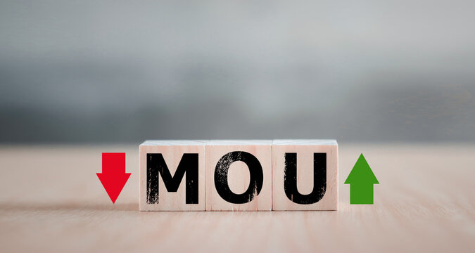 MOU - memorandum of understanding business concept. A nonbinding agreement that states each party's intentions to take action, conduct a business transaction, form a new partnership. Smart