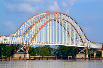 The Tayan Bridge arch is a bridge that crosses the Kapuas River and is the third longest bridge in Indonesia connecting Tayan City and Piasak Village, Sanggau Regency, West Kalimantan Province