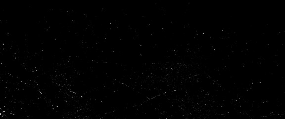 Dust and scratches design. aged photo editor layer. Black grunge abstract background. Copy space, white dust and scratches on a black background. The texture of dirt on the glass.