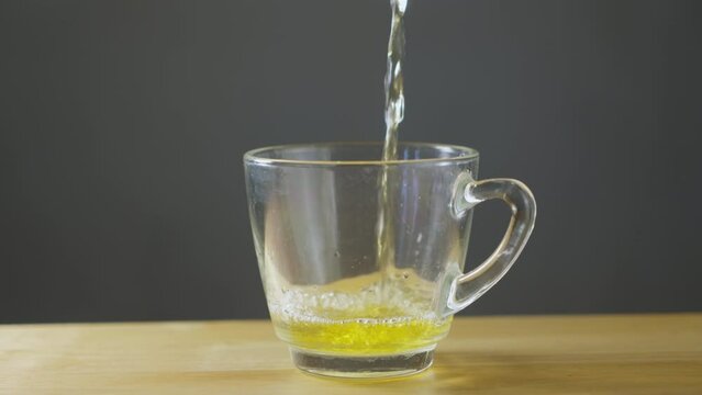 Pouring tea to the glass slow motion b roll 4k.