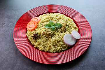 Chicken biryani Spicy Indian Malabar biryani Hyderabadi biryani Dum Biriyani pulao golden bowl Kerala India Sri Lanka Pakistan basmati rice mixed rice dish with meat curry Ramadan Kareem Eid