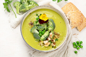 Green soup. Broccoli cream soup. Healthy vegan dish. Top view