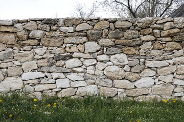  old wild stone wall without mortar