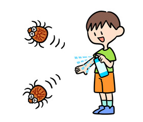 虫除けスプレーを使う男の子