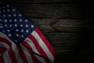 Obraz premium nice any celebration flag 3d illustration. - dark picture of USA flag with big folds on old wood with free space for content