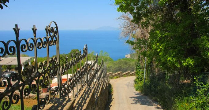 Coastal Town On The Capri Island During Sunny Day In Campania, Italy. Wide Shot