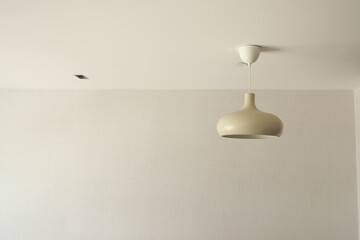  gray ceiling lamp hanging in a room ,