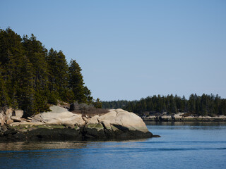 Large granite outcrops at the entrance to North Haven on Vinalhaven island in Maine - 605544570