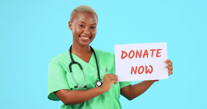 Doctor, donate now sign and black woman on blue background with poster, billboard and banner. Healthcare, medical mockup and portrait of female nurse smile for donation, charity and volunteer help