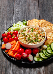 salmon salad with fresh veggies and crackers