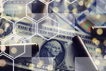 Live ammunition with bullets,  bills, close-up, selective focusing. Concept: sale of weapons under...