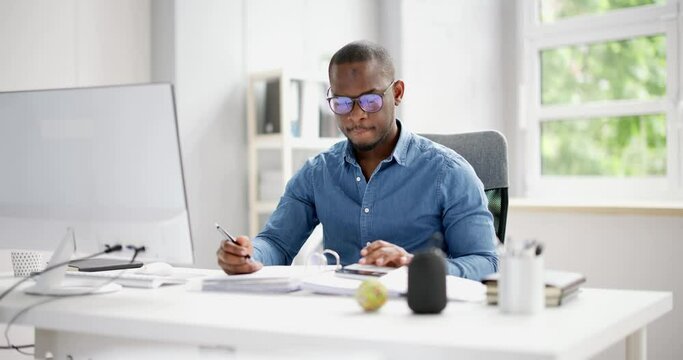 African American Accountant Doing Accounting