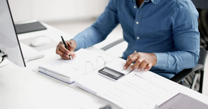 African American Accountant Doing Accounting