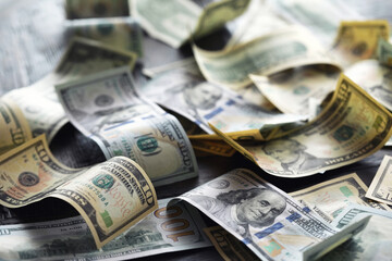 Money, US dollar bills background. Money scattered on the desk. Photography for Finance and Economy...