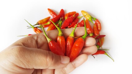 Cabe cabai rawit merah or Red cayenne pepper or Red hot chili pepper isolated on white background....