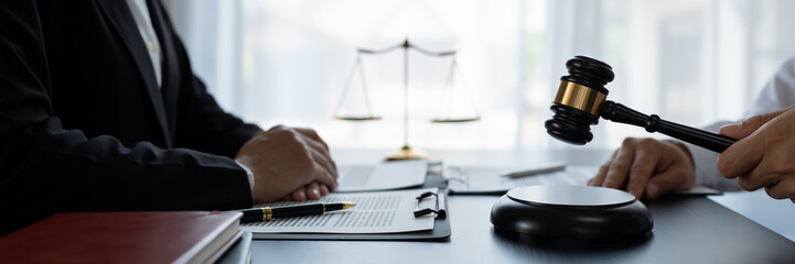 Lawyer or legal advisor finalizes the contract. Business legal agreements, constraints, consulting between lawyers and business clients, tax and legal firms. the concept of righteousness and justice