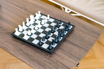 White and black chess pieces on chessboard,chess game.