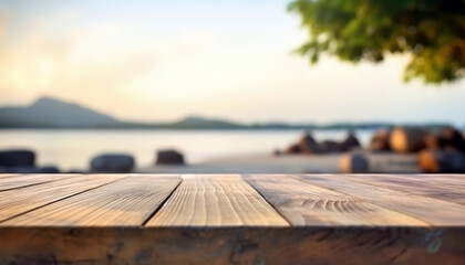 Plakat Wooden table top on blur beach background. High quality photo
