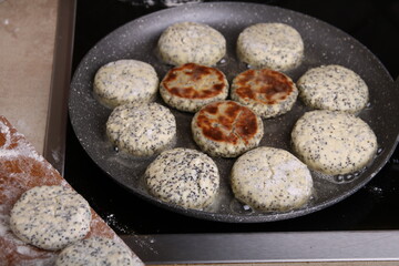 photo of homemade cottage cheese fritters frying