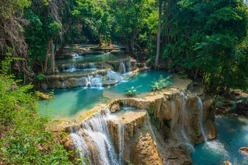 Fototapete Huay Mae Kamin waterfall with blue and clear water in Kanchanaburi Thailand  © KSKittisak