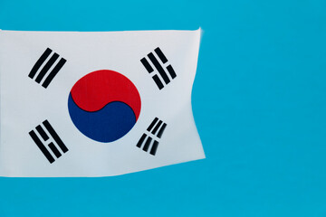 South Korean flag waving on blue background