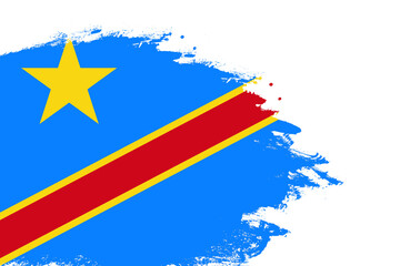 Democratic Republic Of The Congo flag on a stained stroke brush painted isolated white background with copy space