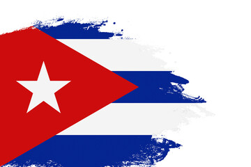 Cuba flag on a stained stroke brush painted isolated white background with copy space