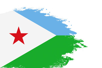 Djibouti flag on a stained stroke brush painted isolated white background with copy space