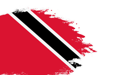 Trinidad And Tobago flag on a stained stroke brush painted isolated white background with copy space
