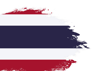Thailand flag on a stained stroke brush painted isolated white background with copy space