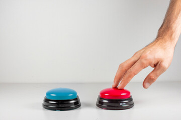 Gently pressing the Blue Button