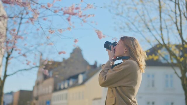a girl taking photo in Aalborg