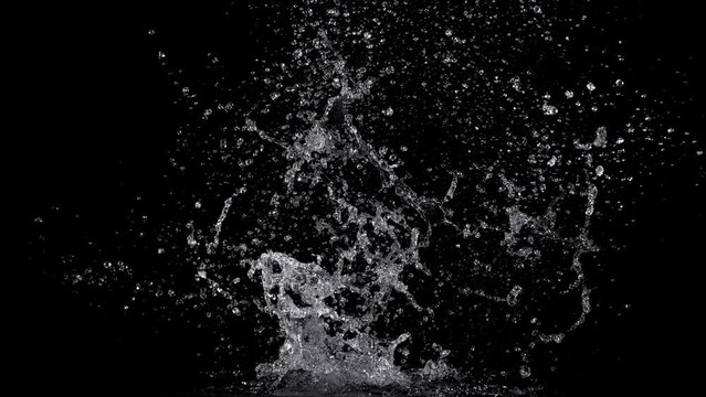 Super Slow Motion Shot of Real Water Splash Explosion from Isolated on Black at 1000fps.