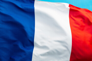 French flag waving on blue background