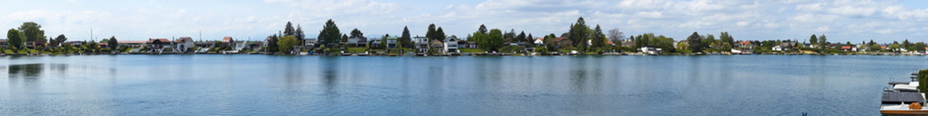 Obraz premium Panoramic view of the lake Bauernsee in Neufeld an der Leitha, Burgenland, Austria, Europe 