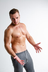 Poor health. Men's problems. Attractive man posing in the studio.