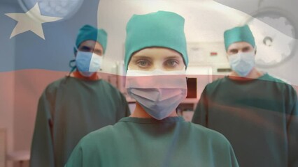 Animation of waving texas flag against team of diverse surgeons standing together at hospital - Powered by Adobe