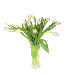 Bouquet of pink tulips in a clear vase