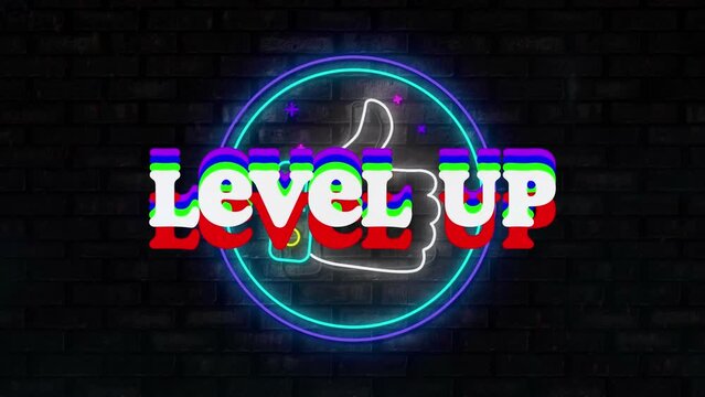 Animation of colorful level up text banner over neon like icon against brick wall background