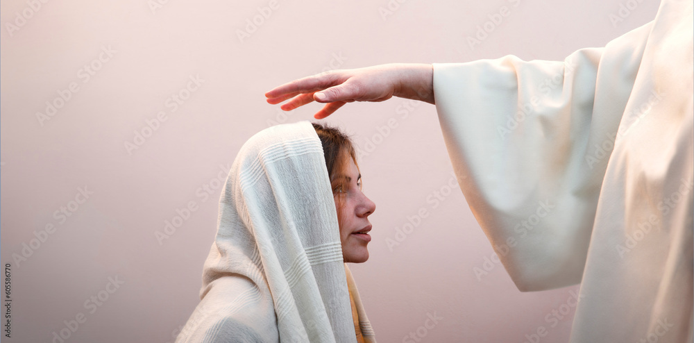 Sticker blessing hand above the head of a woman in a headscarf