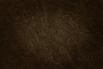Dark brown slate stone wall texture background in natural pattern for decorative interior and exterior.