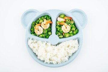 A plate of nutritious meals for kids, fried okra with shrimp and rice