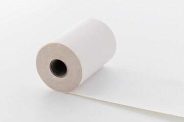 unwound paper roll, copy space, isolated on white background.