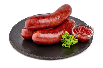 German grilled pork sausages, close-up, isolated on white background.