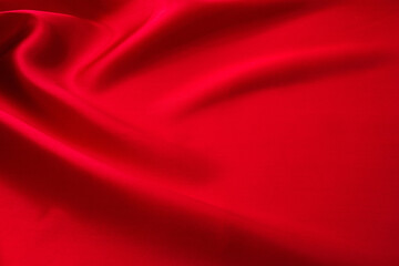 Naklejka na ściany i meble Close up of red silk background