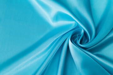 Close up of light blue silk background