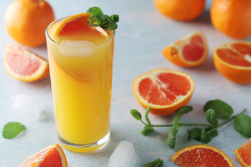 Red oranges juice with mint and ice