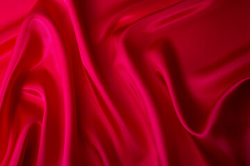 Naklejka na ściany i meble Close up of dark red silk background