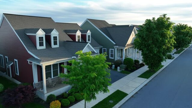 Aerial Establishing Shot Of Houses In Retirement Community In America. 55 Plus Housing In Spring Theme.