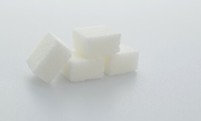 Group of sugar cubes on white background